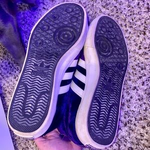 purple adidas high top sneaker